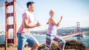 man and woman running in San Francisco