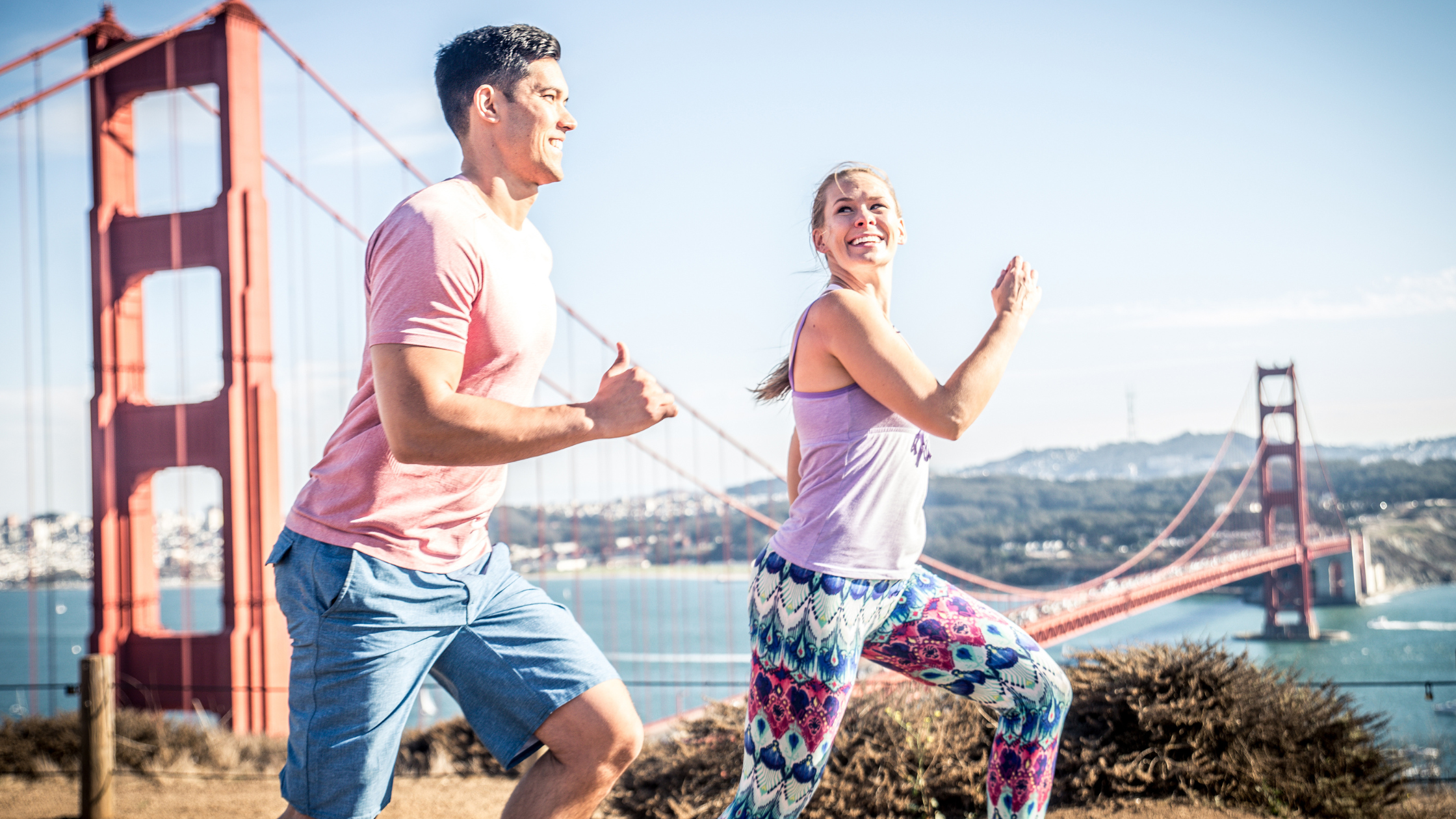 man and woman running in San Francisco